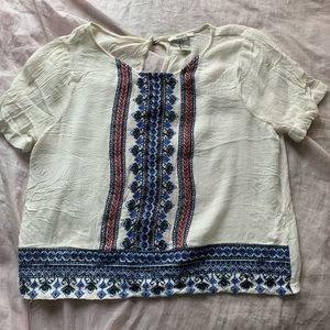 white embroidered crop top